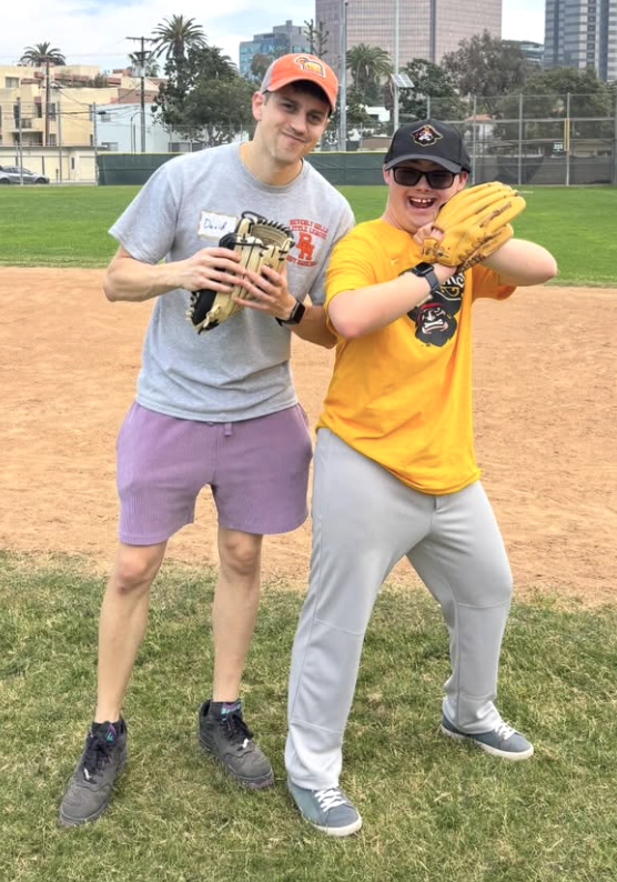 Two players posing with gloves up before a game